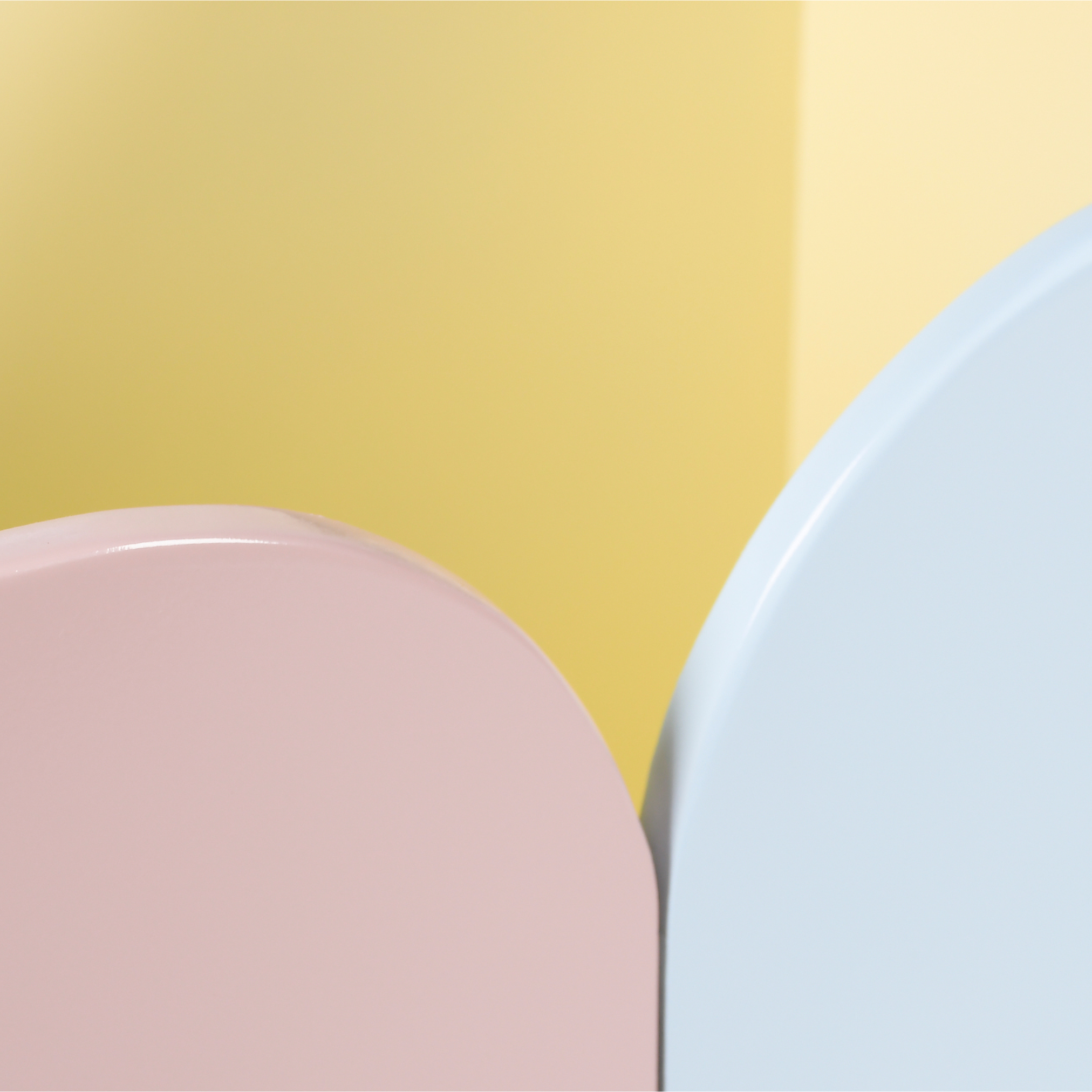 Close up of pastel pink blue and cream cloud detailing on kids storage unit