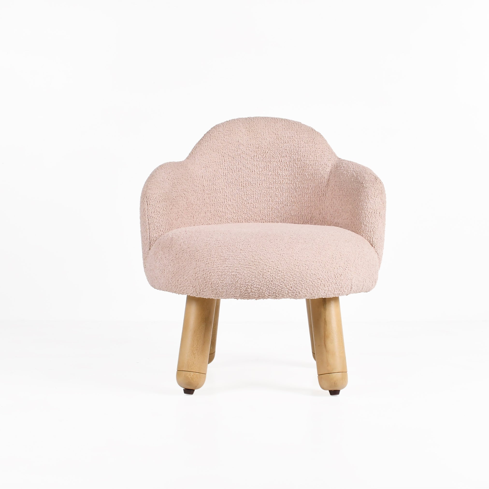 Front view of Cove upholstered kids lounge chair in soft pink finish
