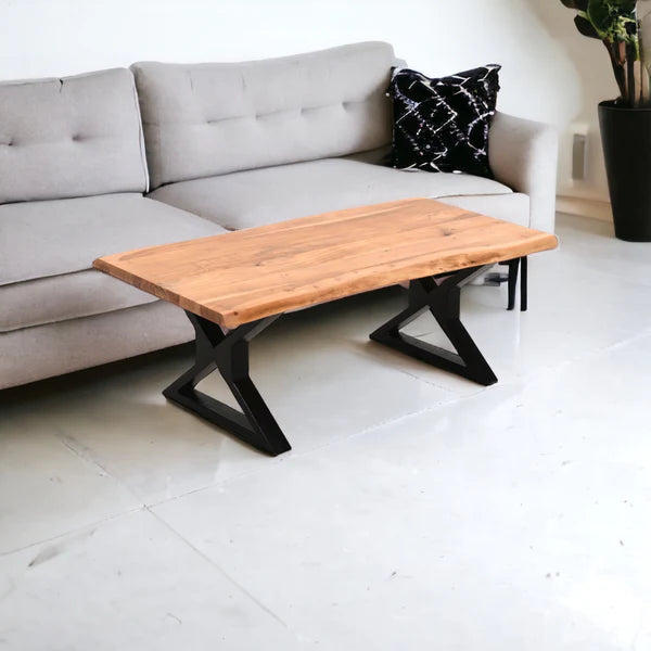 live edge acacia wood coffee table styled in modern rustic living room interior