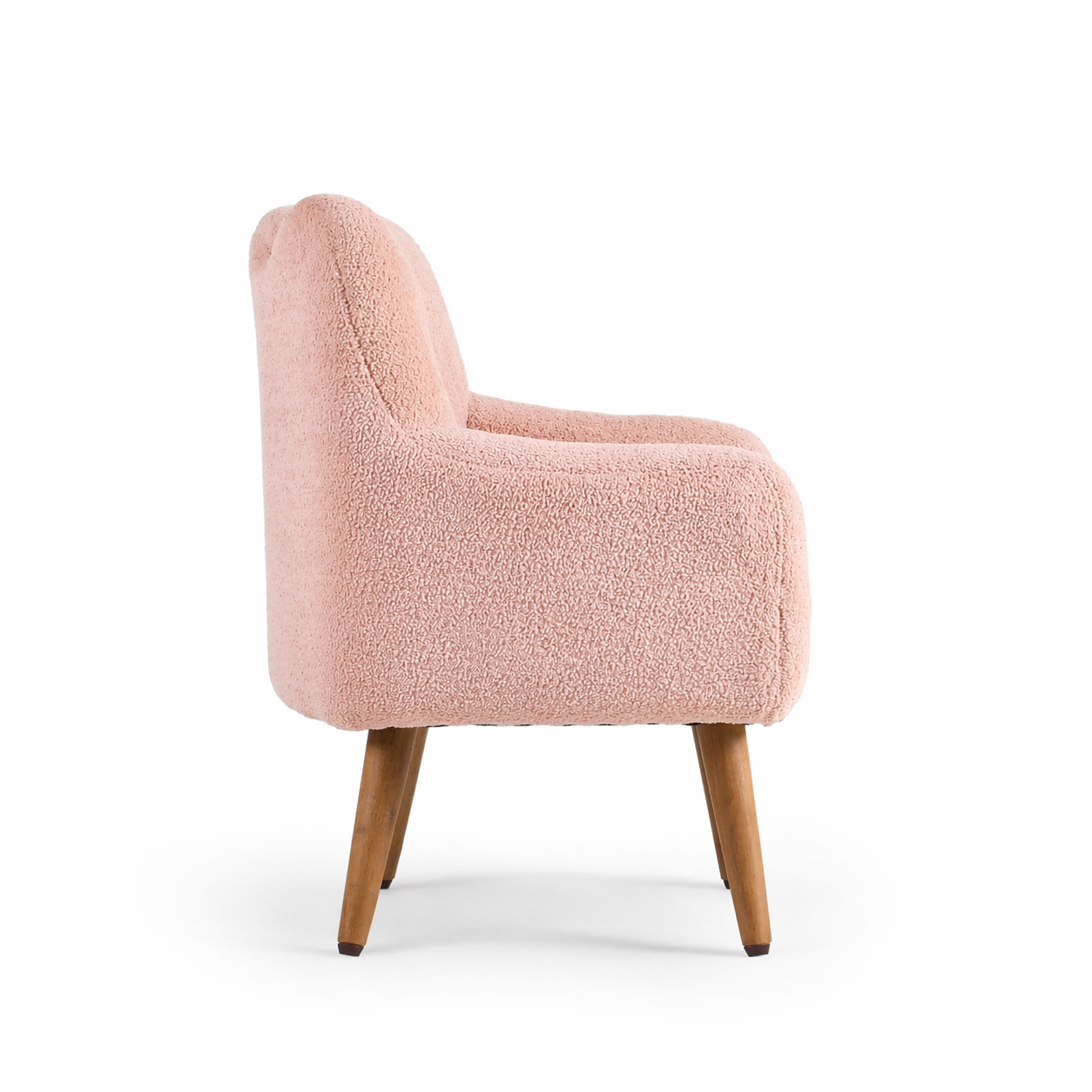Side profile of pink upholstered kids lounge chair with wooden legs