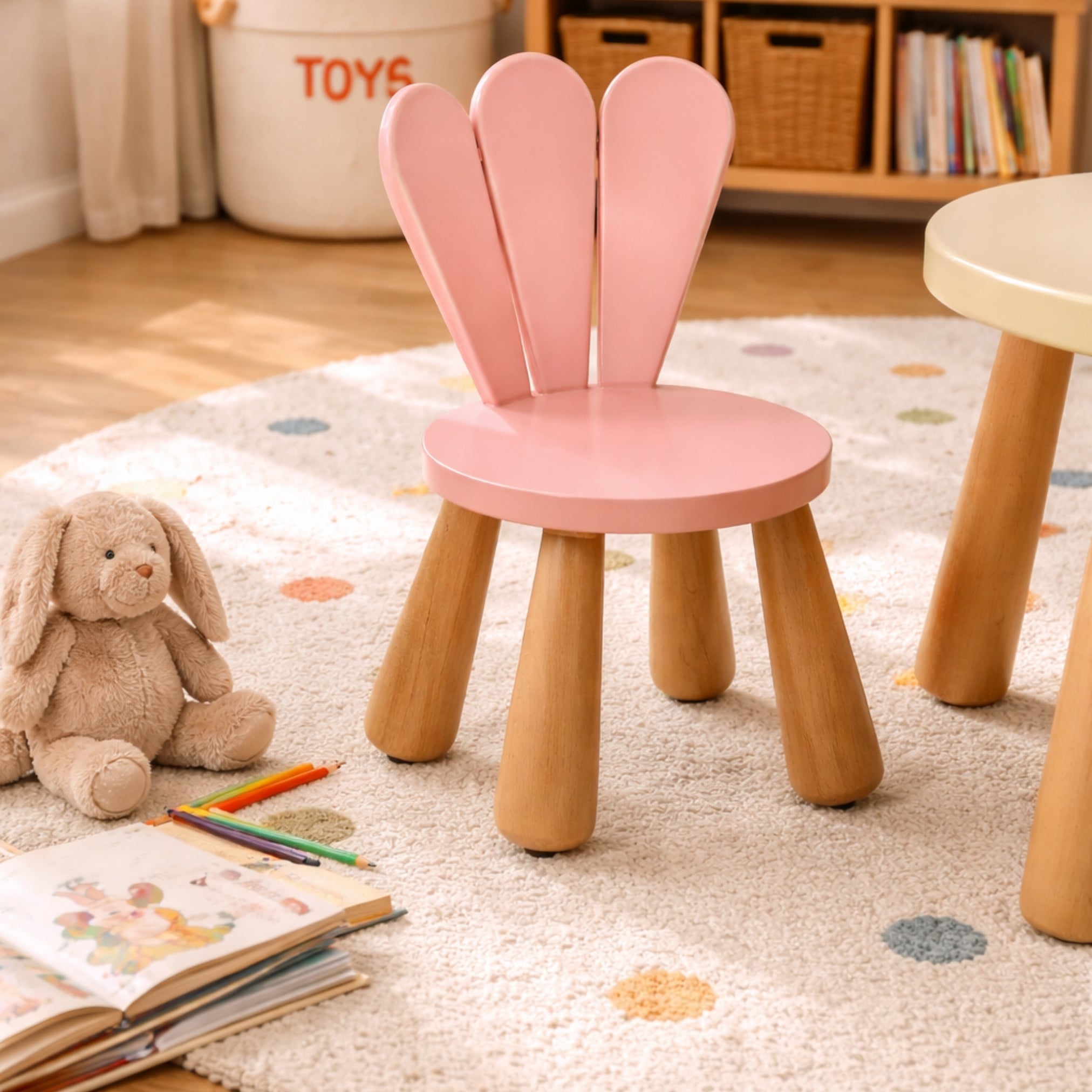 pink petal wooden kids chair on soft rug