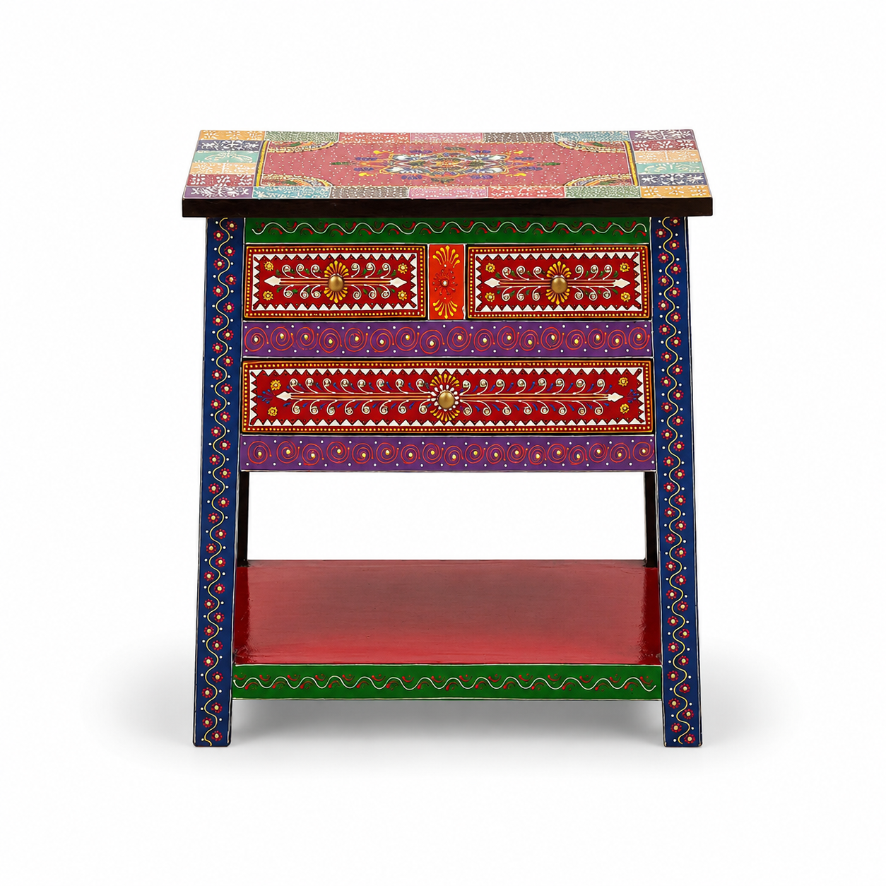 Front view of Rangriti handpainted wooden side table with two small drawers, one large drawer, and open storage shelf featuring traditional Indian folk art.