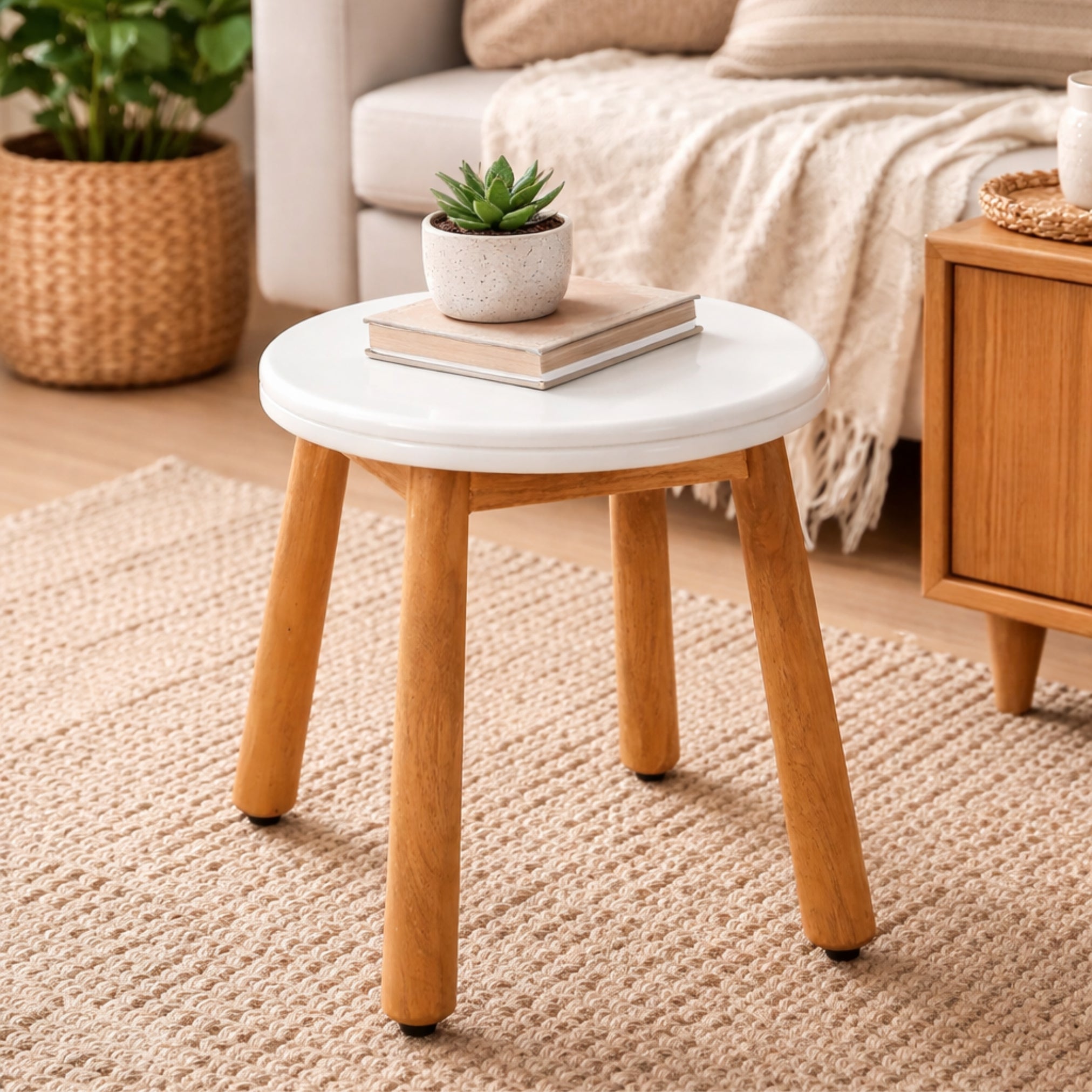 wooden pebble stool with white top in living space