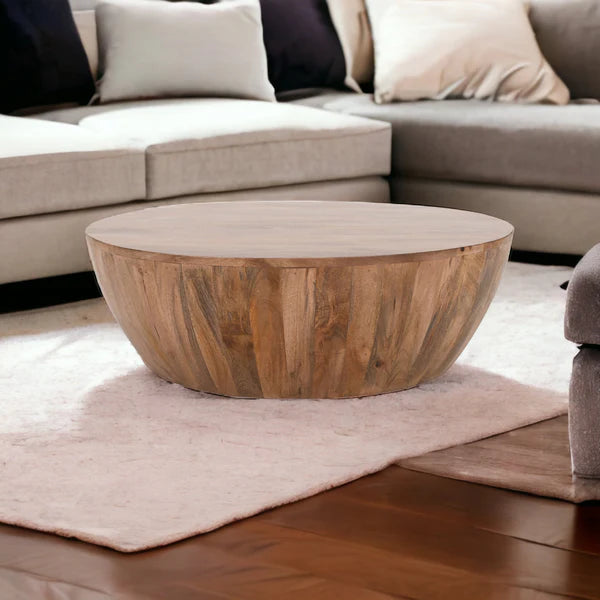 mango wood drum coffee table styled in modern farmhouse living room interior