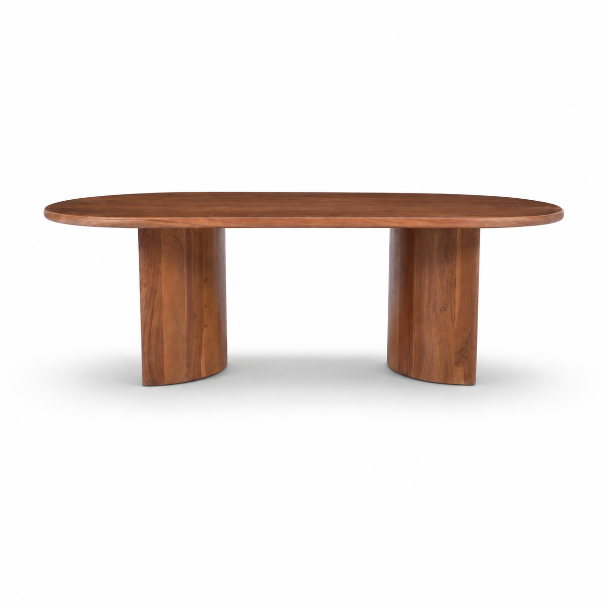 Aurora Oval Coffee Table in solid acacia wood with sculptural crescent pedestal base — front studio view.