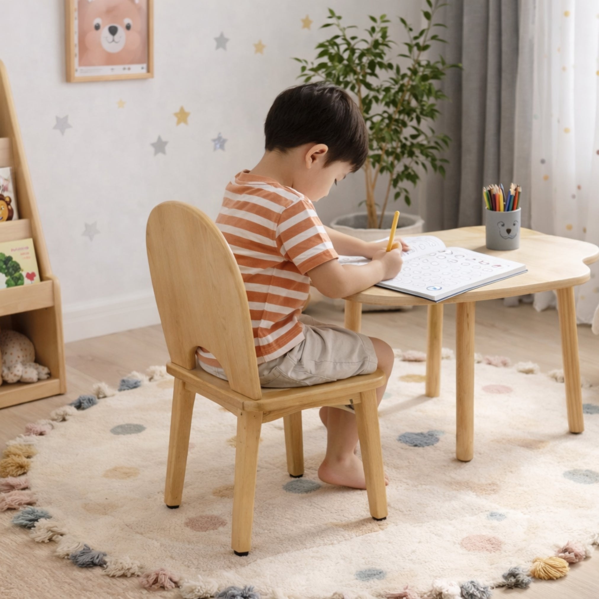 Child sitting on wooden kids chair
