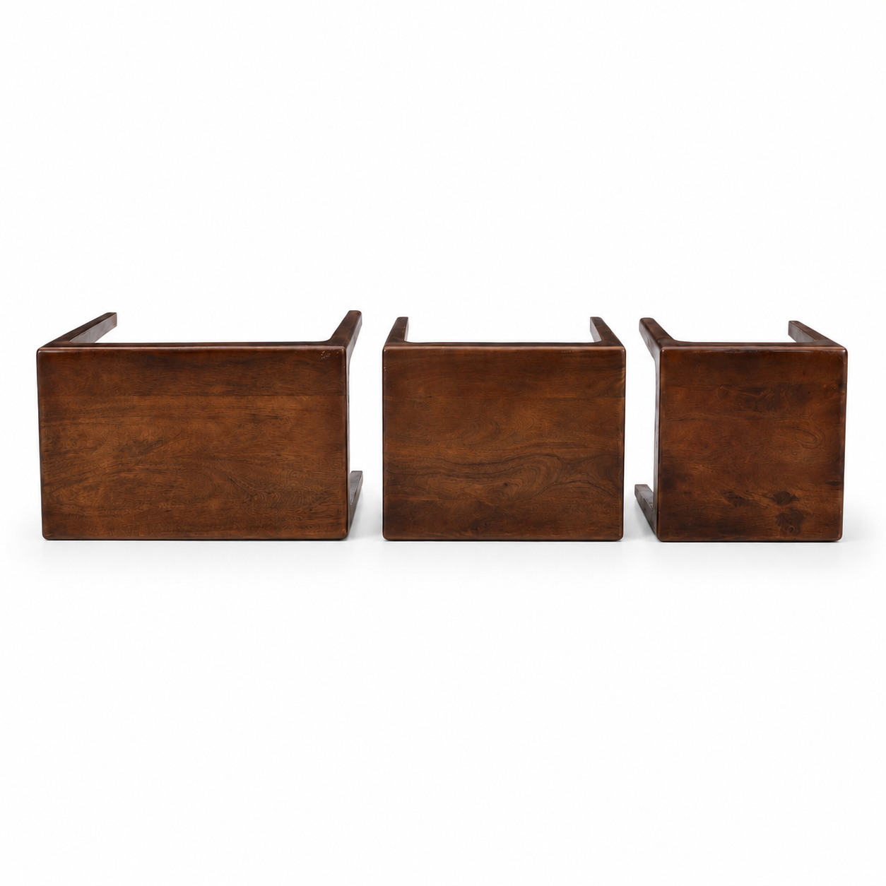 Three wooden chair backs in a row of descending sizes, showcasing a rich medium-to-dark brown wood grain finish on a solid white background.