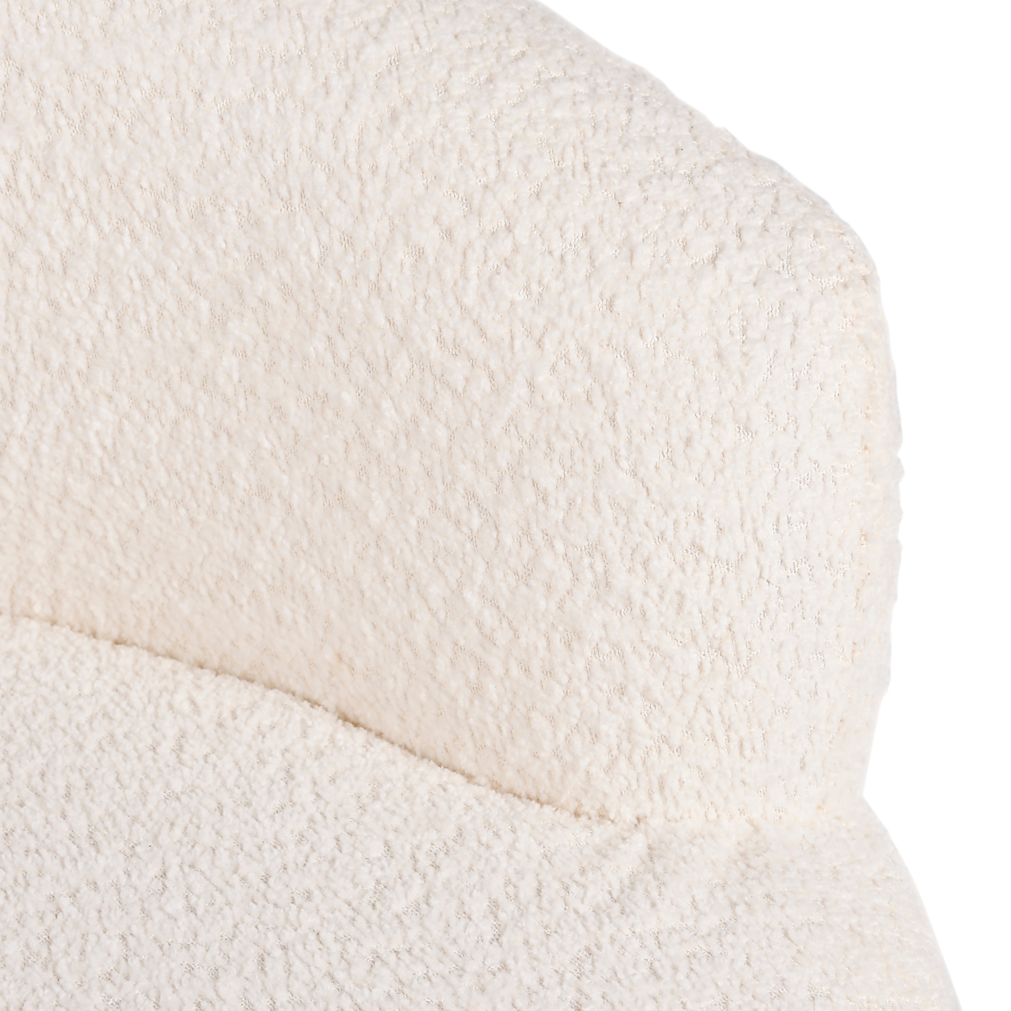 Close-up detail of cream boucle upholstery on Cocoon kids lounge chair