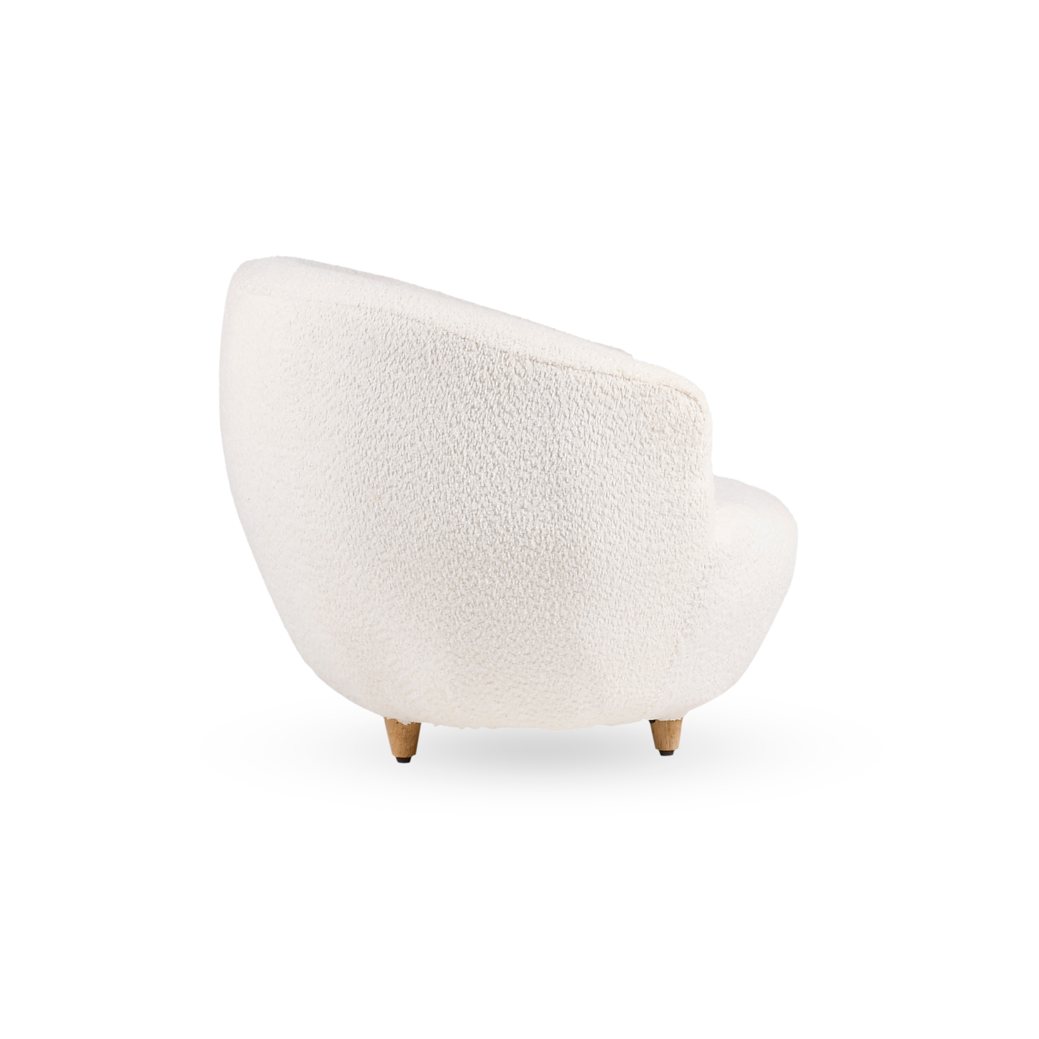 Side profile of Cocoon upholstered kids lounge chair with curved backrest and wooden legs