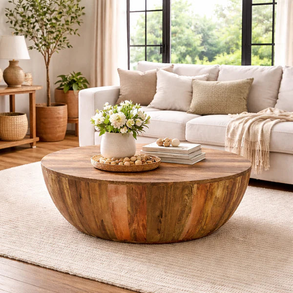 round drum mango wood coffee table in natural finish for modern living room
