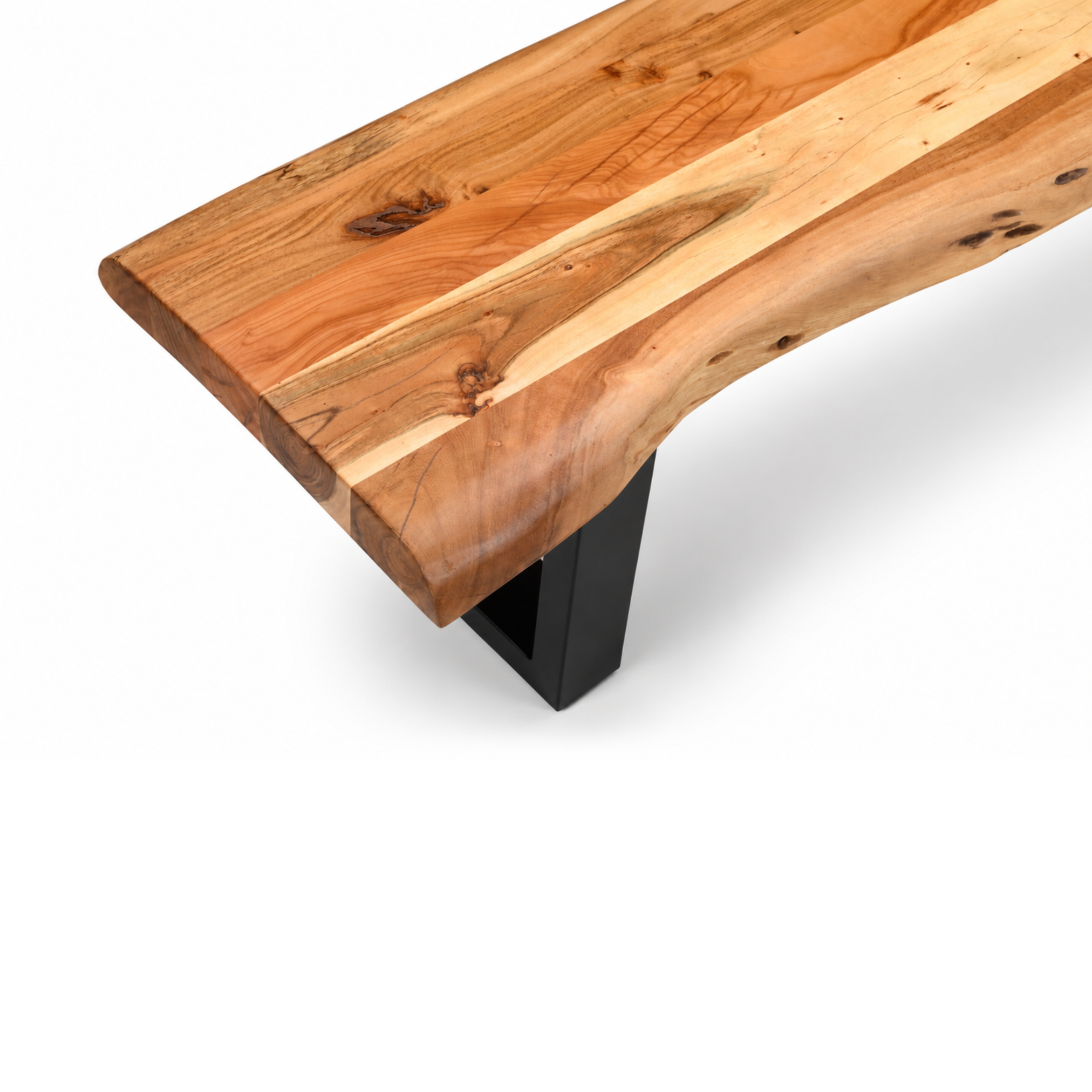 Close-up detail of live edge acacia wood top on Dune bench with natural grain texture