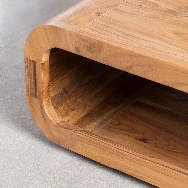 close up of handcrafted acacia wood coffee table showing natural finish and texture