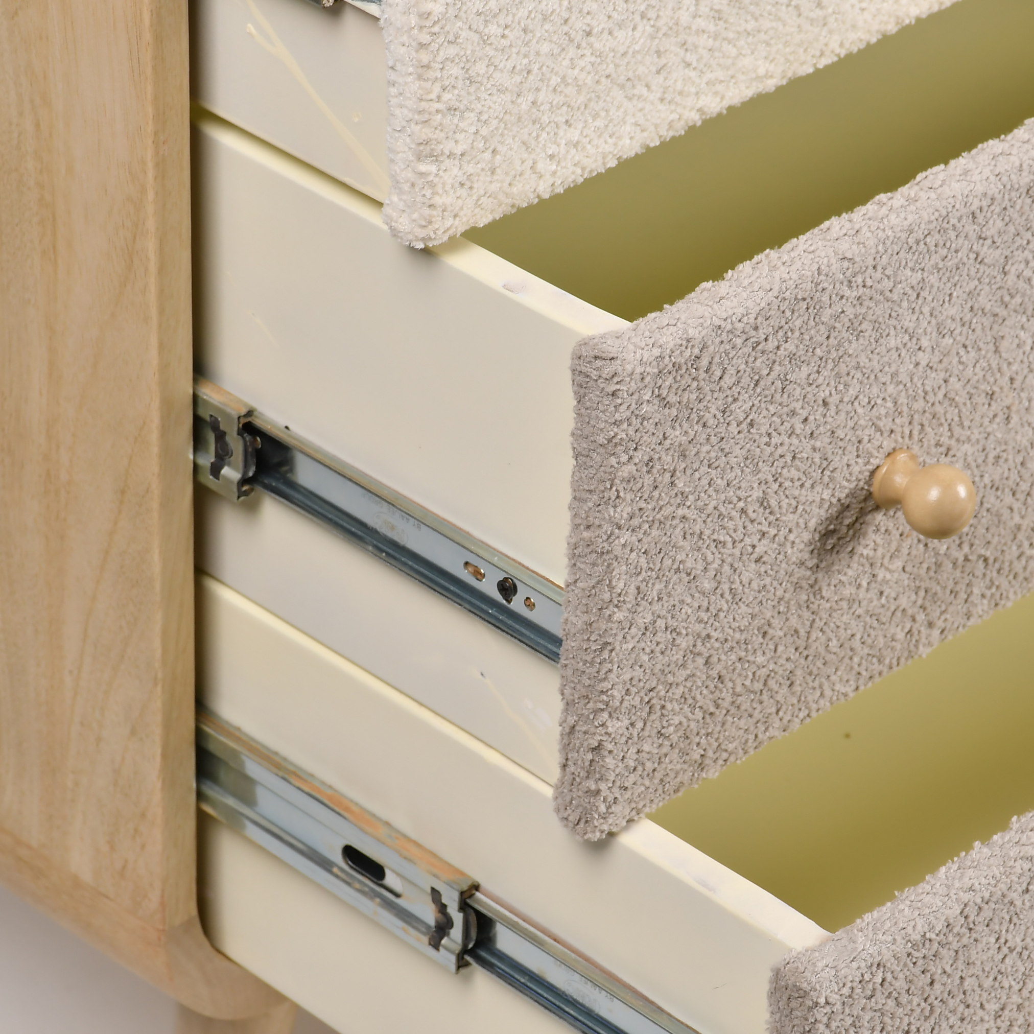 Close-up detail of Loft wooden kids storage dresser drawers with smooth sliding channels
