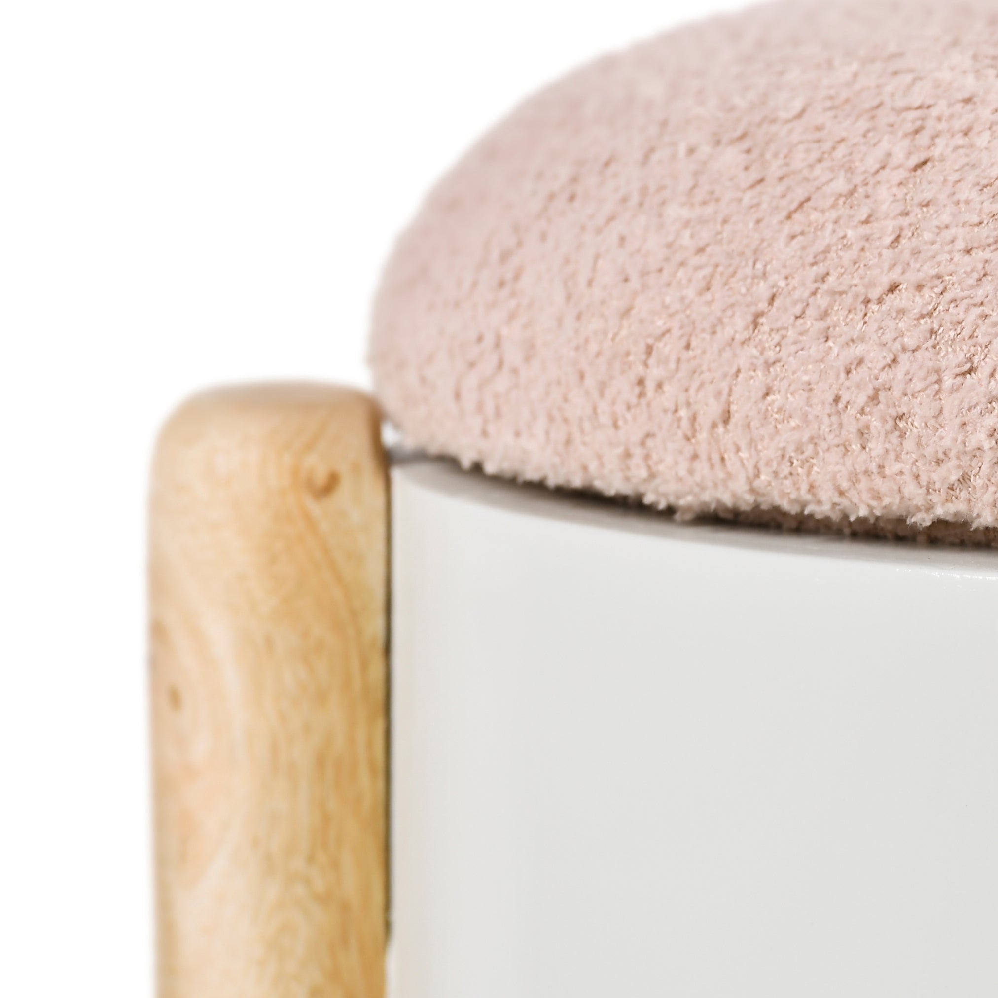 Pink puff stool fabric texture and wooden leg detail