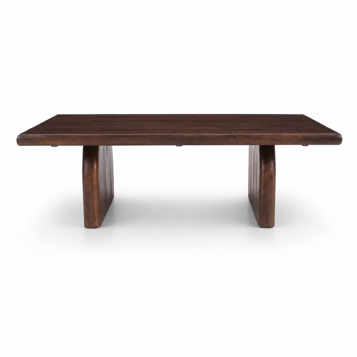 Front view of Sojourn Rectangular Coffee Table showcasing thick tabletop and curved pedestal base design