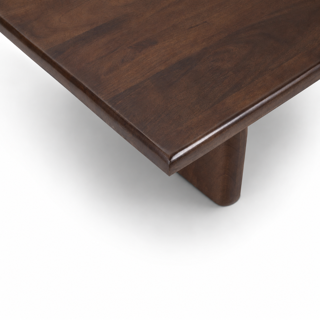 Sojourn Rectangular Coffee Table crafted from solid mango wood featuring rounded edges and rich walnut finish.